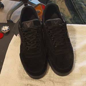 This is an authentic LOUIS VUITTON Suede Mens LV Trainer Sneakers in size 8 in